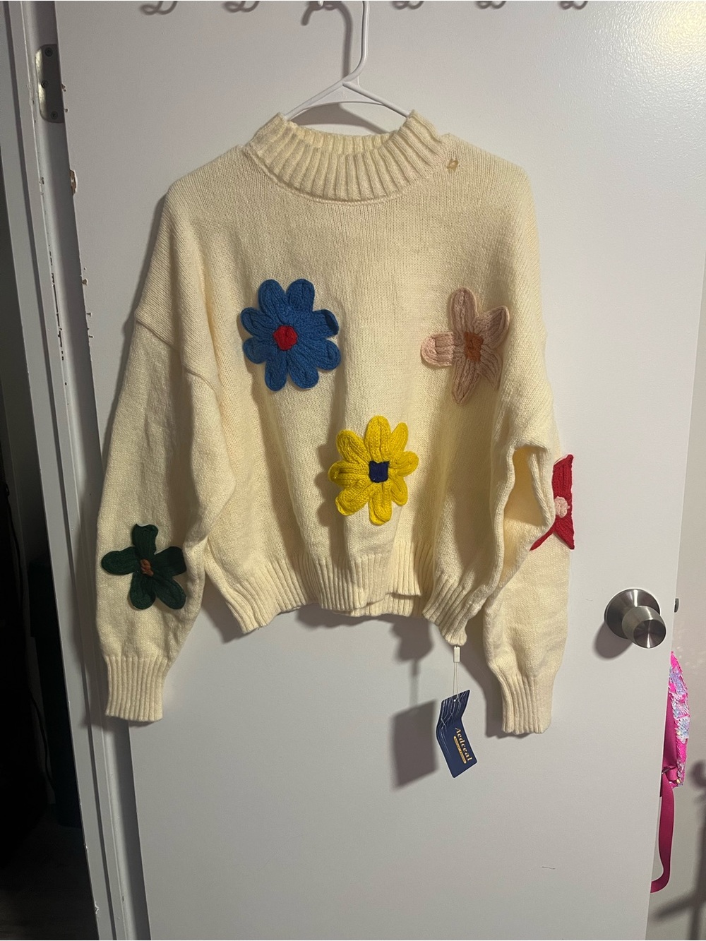 Amazon Cream Knit Turtleneck Sweater with Colorful Floral Appliques